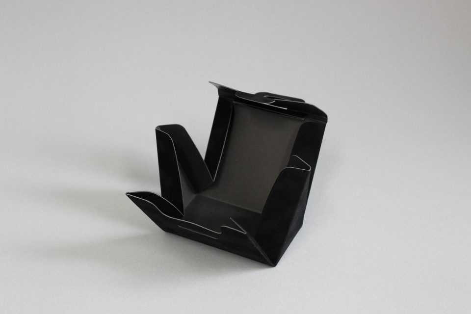 コスメのパッケージ（バッグ風組み箱（フロッキー仕上げ））